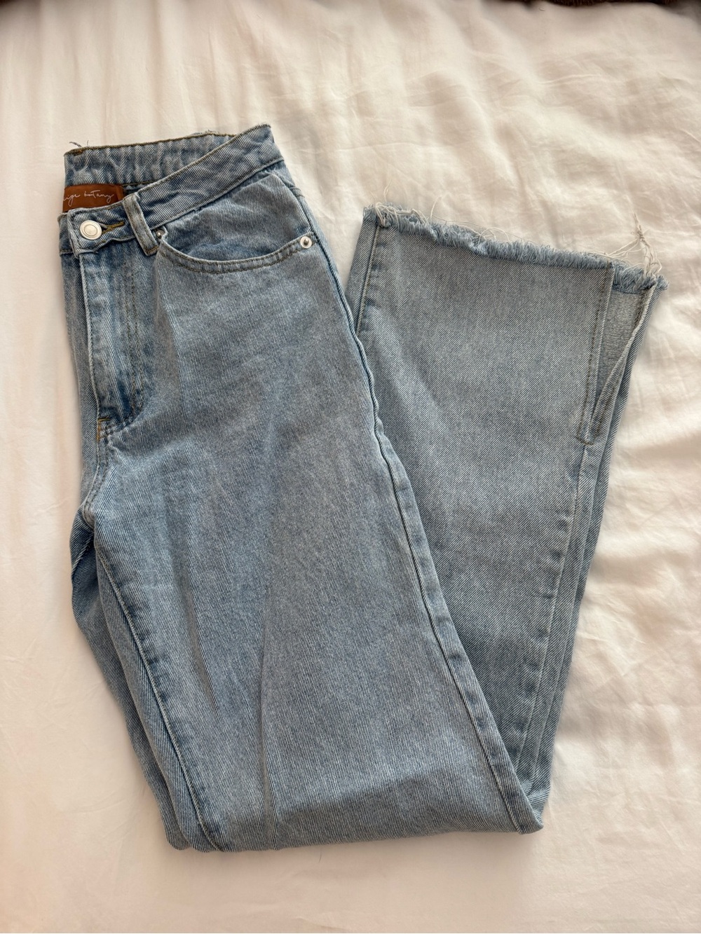 High rise light wash split hem jeans size small